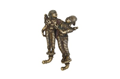 Lot 37 - AN INDIAN BRASS EROTIC NUTCRACKER