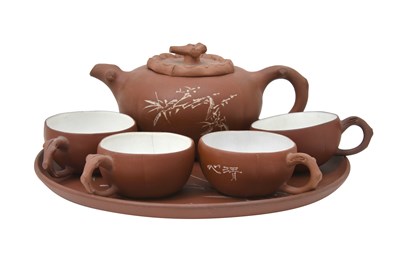 Lot 45 - A YIXING TEA SET BY SHISHĒNG