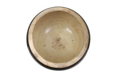 Lot 9 - A BROWN-GLAZED ALMS BOWL