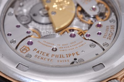 Lot 67 - A LIMITED EDITION MEN'S PATEK PHILIPPE PLATINUM AND 18K ROSE GOLD AUTOMATIC WRISTWATCH.