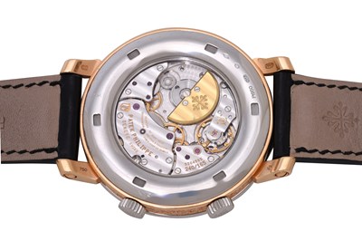 Lot 67 - A LIMITED EDITION MEN'S PATEK PHILIPPE PLATINUM AND 18K ROSE GOLD AUTOMATIC WRISTWATCH.