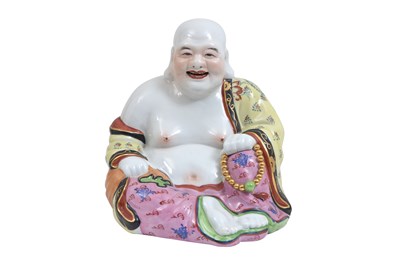 Lot 37 - A WHITE-GLAZED AND TWO FAMILLE ROSE FIGURES OF BUDAI HESHANG