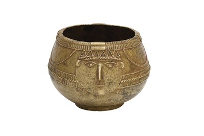 Lot 52 - A TRIBAL ORISSAN BRASS DHOKRA MEASURING BOWL