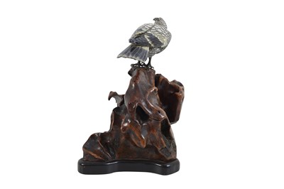 Lot 96 - AN ENAMELLED SILVER MODEL OF A HAWK