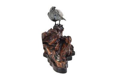 Lot 96 - AN ENAMELLED SILVER MODEL OF A HAWK