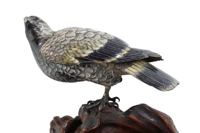 Lot 96 - AN ENAMELLED SILVER MODEL OF A HAWK