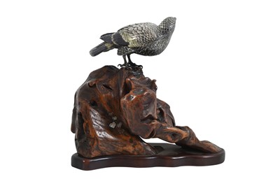 Lot 96 - AN ENAMELLED SILVER MODEL OF A HAWK