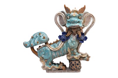 Lot 48 - A PAIR OF LARGE GLAZED POTTERY 'LION DOGS' ROOF TILES