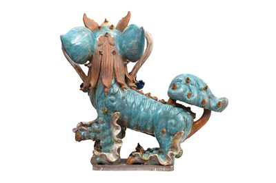 Lot 48 - A PAIR OF LARGE GLAZED POTTERY 'LION DOGS' ROOF TILES