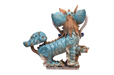 Lot 48 - A PAIR OF LARGE GLAZED POTTERY 'LION DOGS' ROOF TILES