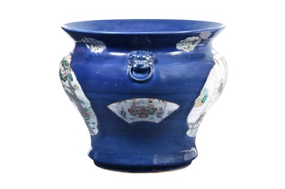 Lot 38 - A LARGE POWDER BLUE-GROUND FAMILLE ROSE FISHBOWL