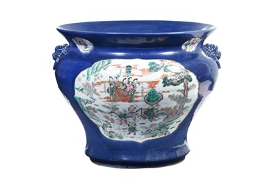 Lot 38 - A LARGE POWDER BLUE-GROUND FAMILLE ROSE FISHBOWL