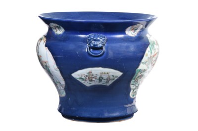 Lot 38 - A LARGE POWDER BLUE-GROUND FAMILLE ROSE FISHBOWL