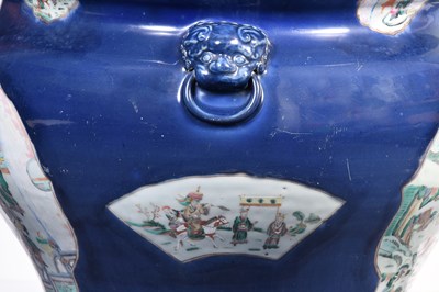 Lot 38 - A LARGE POWDER BLUE-GROUND FAMILLE ROSE FISHBOWL