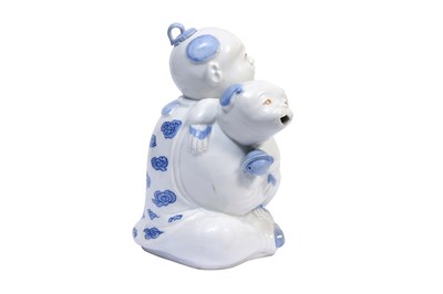 Lot 79 - A HIRADO 'KARAKO AND PUPPY' TEAPOT AND COVER