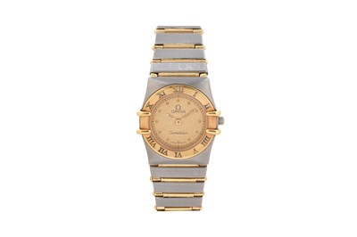 Lot 9 - A LADIES 18K YELLOW GOLD AND STAINLESS STEEL QUARTZ BRACELET WATCH.