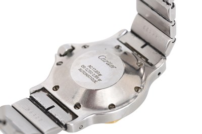 Lot 49 - A UNISEX CARTIER 18K YELLOW GOLD AND STAINLESS STEEL AUTOMATIC BRACELET WATCH.